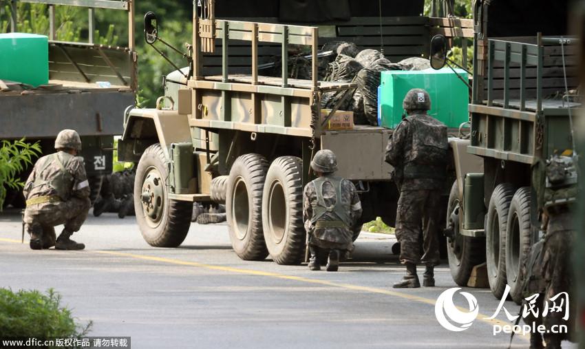 韩士兵杀7战友 一校官被打穿胳膊:其父母劝降中