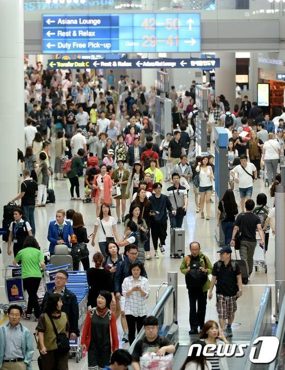 中秋小长假 韩国返乡团圆潮海外旅行潮并现（组图）