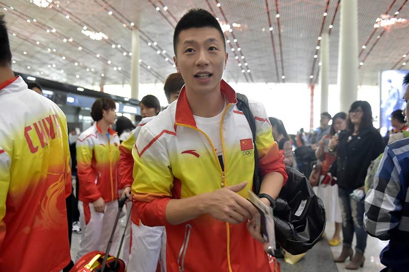刘国梁率领中国乒乓队踏上仁川亚运征程(组图）
