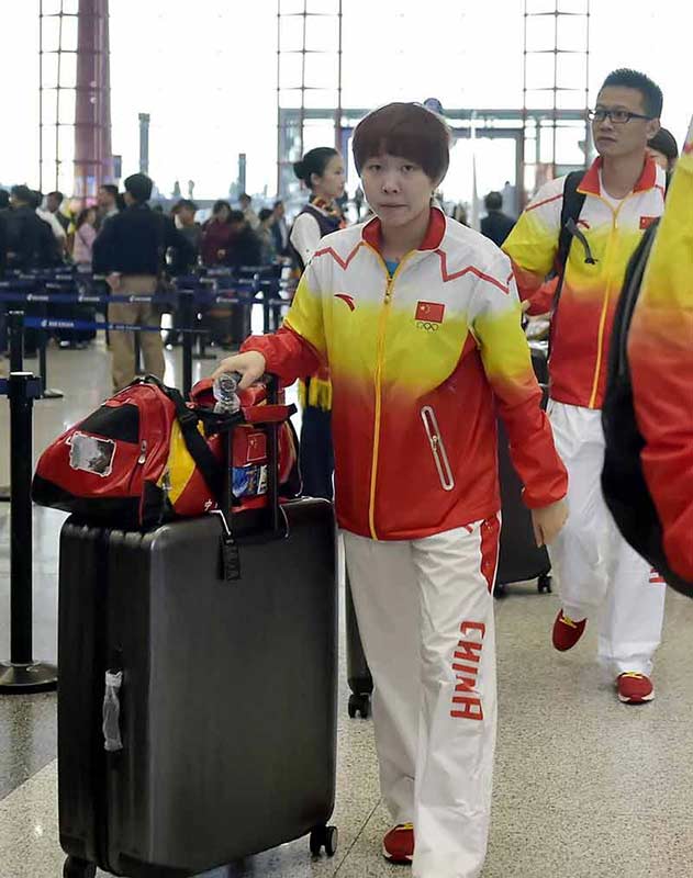 刘国梁率领中国乒乓队踏上仁川亚运征程(组图）