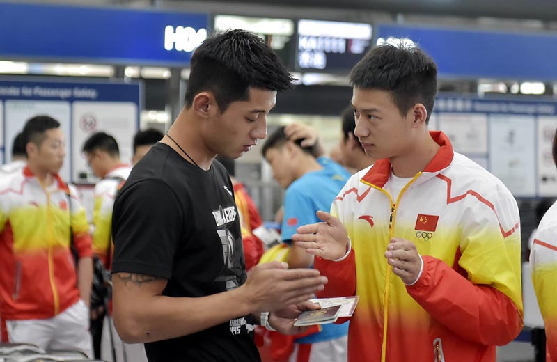 刘国梁率领中国乒乓队踏上仁川亚运征程(组图）