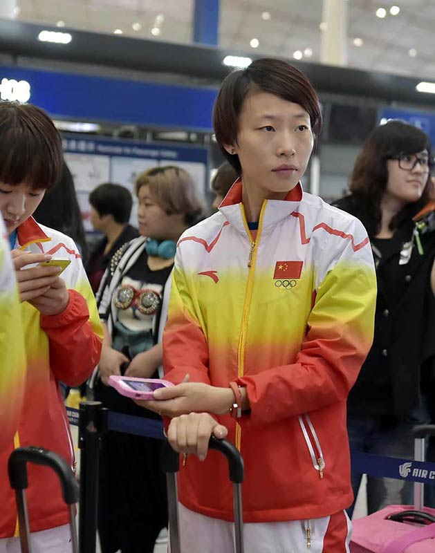 刘国梁率领中国乒乓队踏上仁川亚运征程(组图）