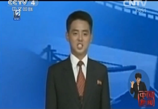 朝鲜央视“花美男”播音员亮相引关注:风格柔和亲切（组图）