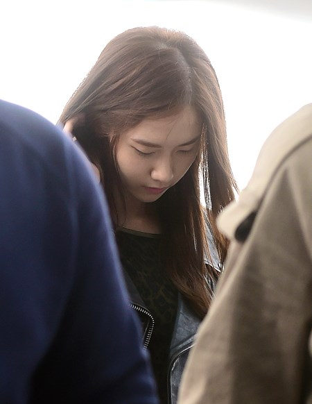 少女时代8人“满面愁容”来华 似受Jessica退团影响（高清组图）