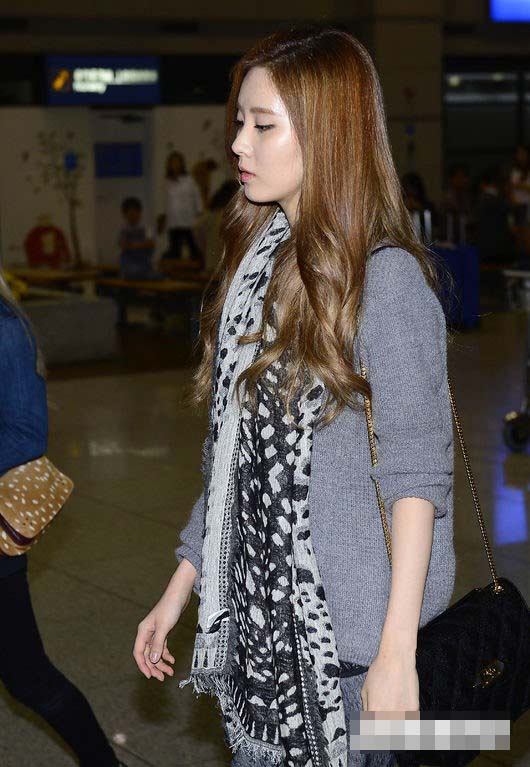 少女时代返韩 表情严肃似受Jessica事件影响（组图）