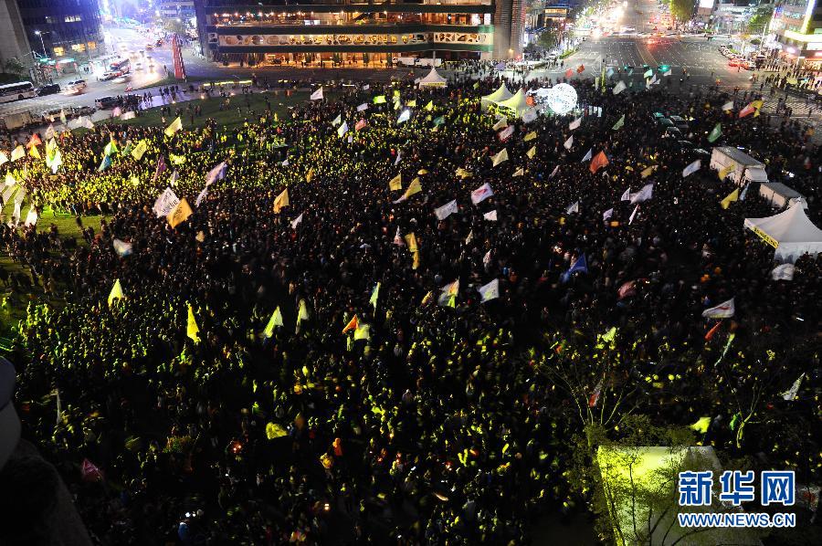 韩国民众举行集会纪念“岁月”号海难一周年（组图）