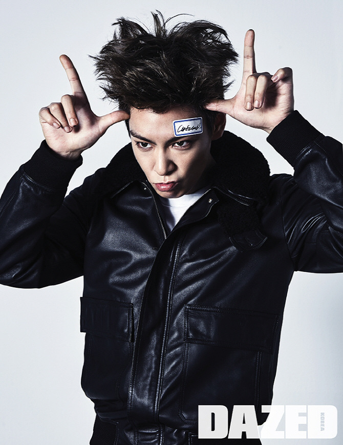 Bigbang成员T.O.P拍写真 展现调皮搞怪一面【组图】
