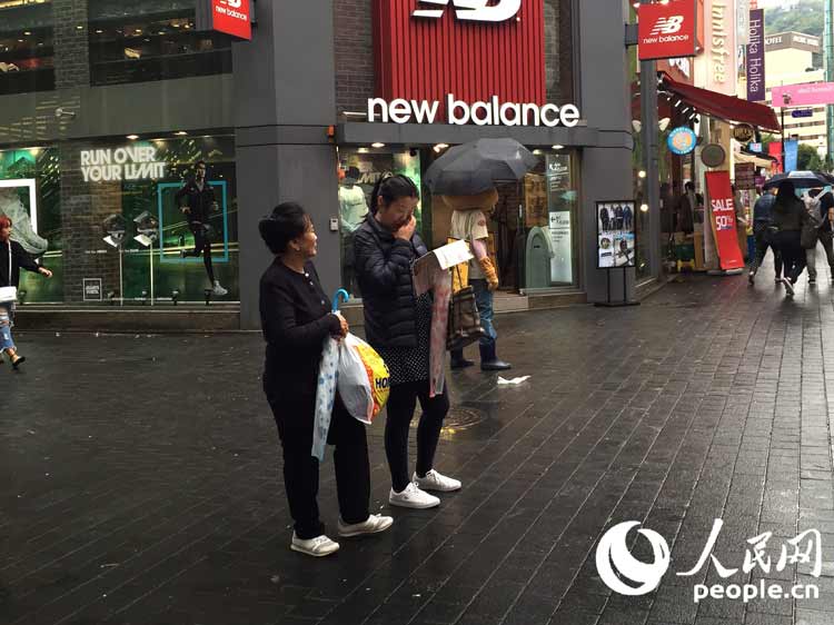 中国游客十一赴韩购物 从任性到理性【组图】