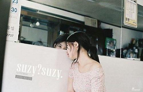 李敏镐女友秀智首部写真集照片曝光 演绎少女清纯诱惑（组图）