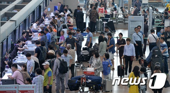 仁川机场迎来夏季客流高峰 客流量同比增加26.5%【组图】