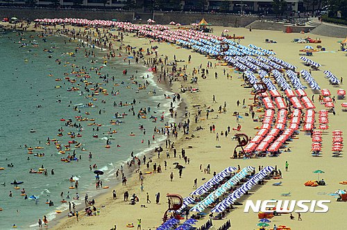 下饺子！热浪袭韩 海云台海水浴场迎大批游客【组图】