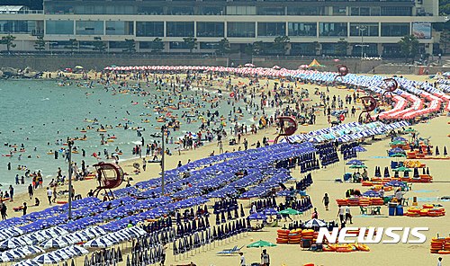 下饺子！热浪袭韩 海云台海水浴场迎大批游客【组图】