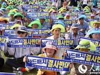 韩国民众近千人削发反“萨德”