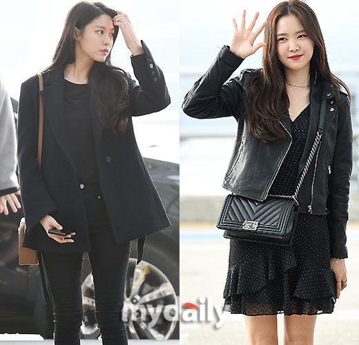 兩人酷炫的“all black”機場時尚。