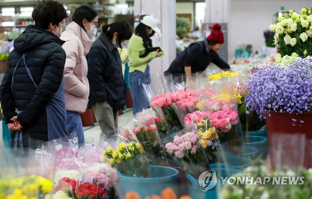 【組圖】韓國畢業季花卉市場人氣旺【2】