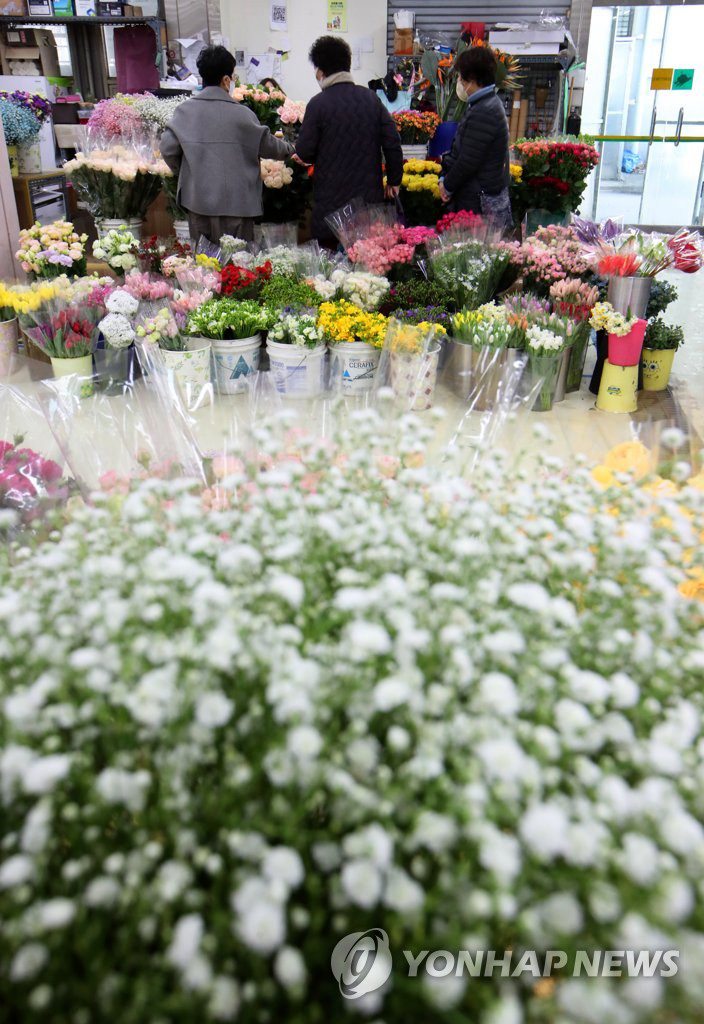 【組圖】韓國畢業季花卉市場人氣旺【7】