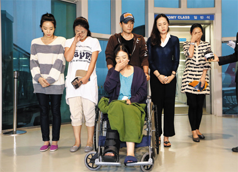 韩亚航空失事客机乘务员返抵韩国