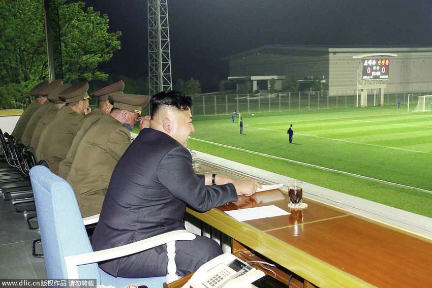 金正恩观看朝鲜男足及射箭比赛 要求发展体育强国(高清大图)